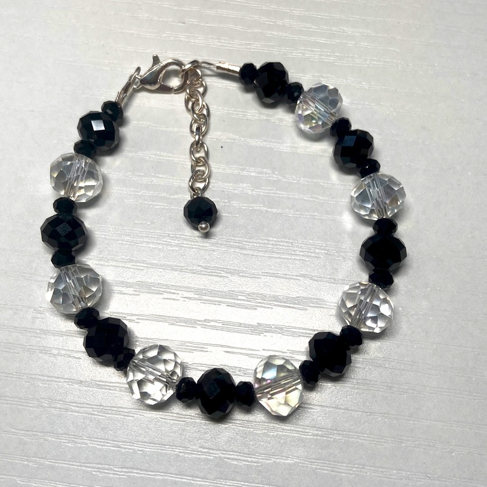 Handmade black and clear glass beaded bracelet.